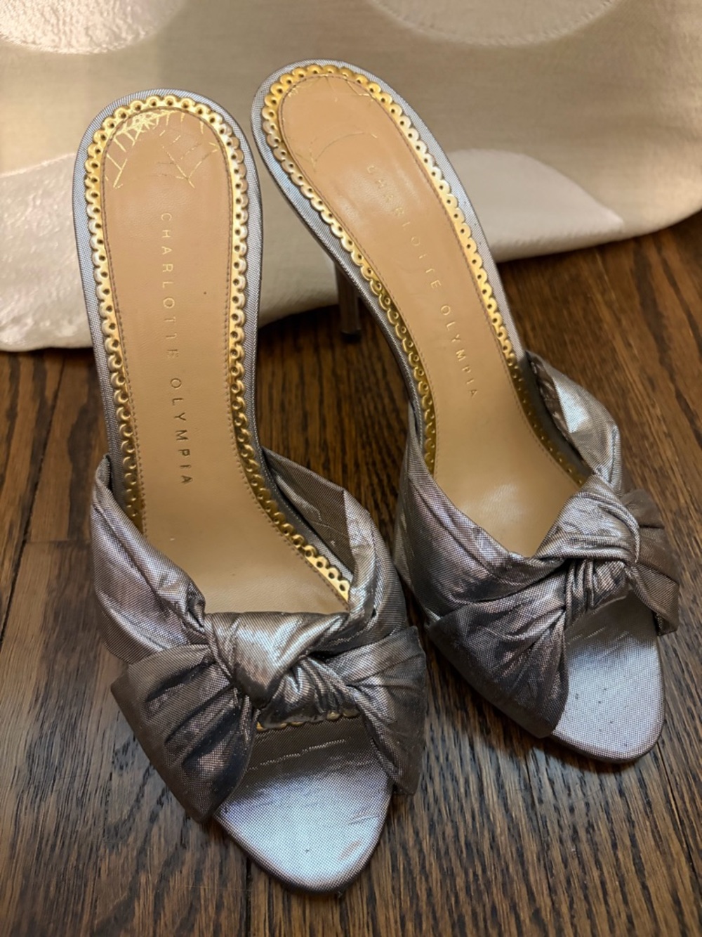 Charlotte Olympia Metallic Silver Knotted Satin Mule Heels